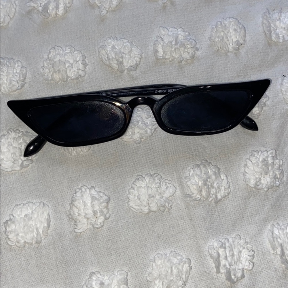 Black cat eyed sunglasses.
